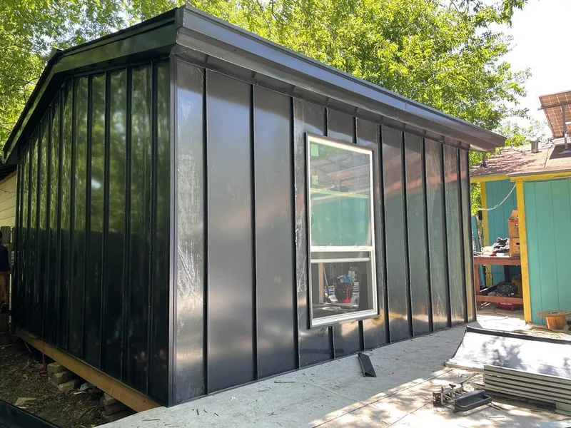 Black standing seam metal wall panels for Metal Roof Installation in Bee Cave