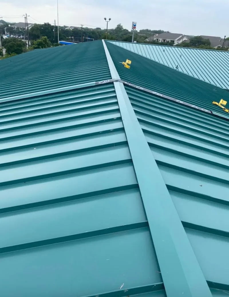 Green commercial metal roof ridge and valley for Metal Roof Repair in Bee Cave